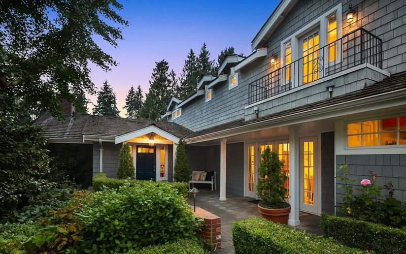 Shingle-style estate at twilight