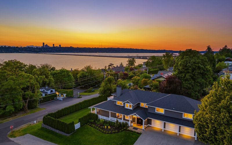 Aerial view of lakefront estate on Mercer Island at sunset