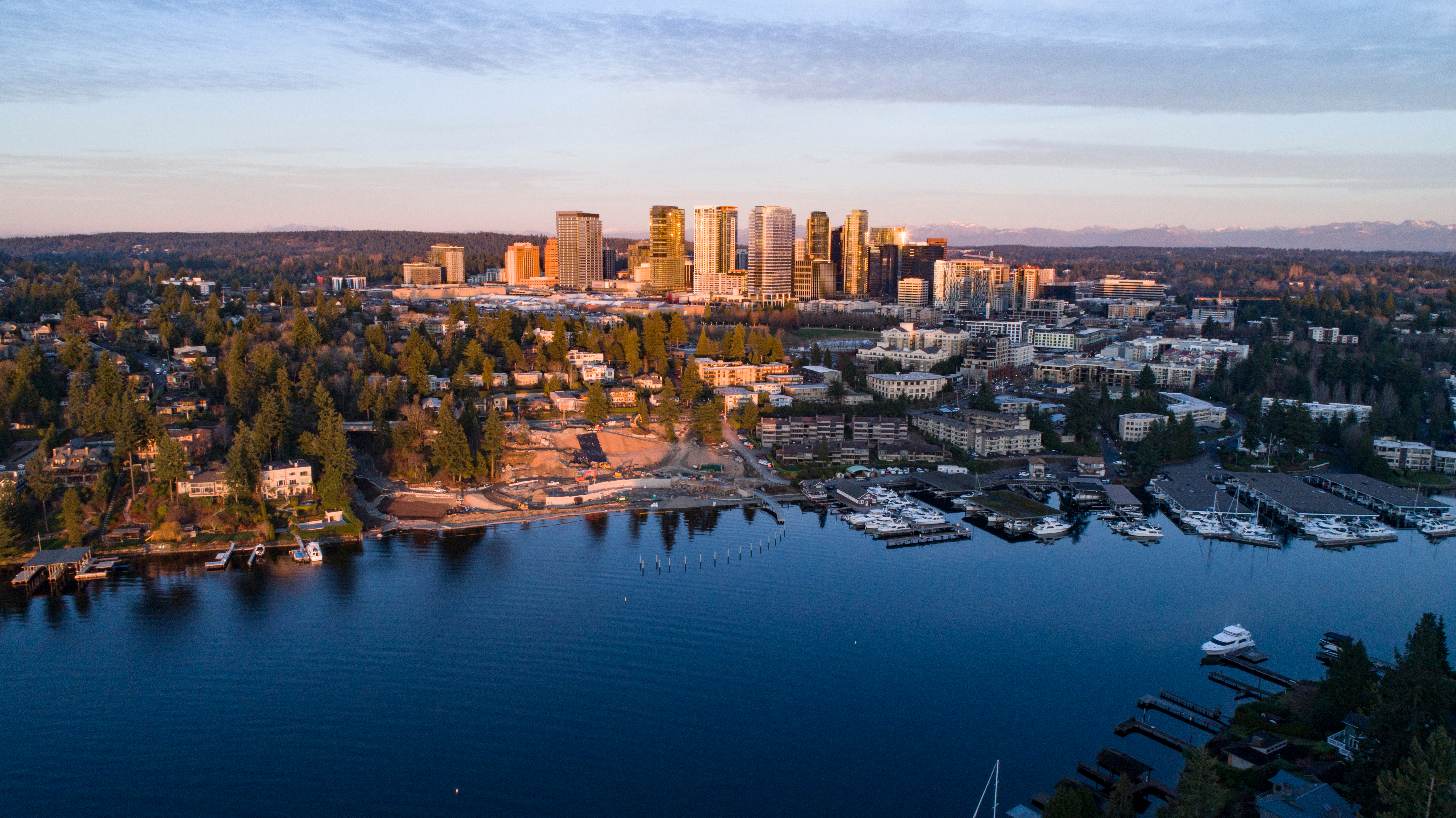 Aerial view of Downtown Bellevue and Lake Washington marina at golden hour