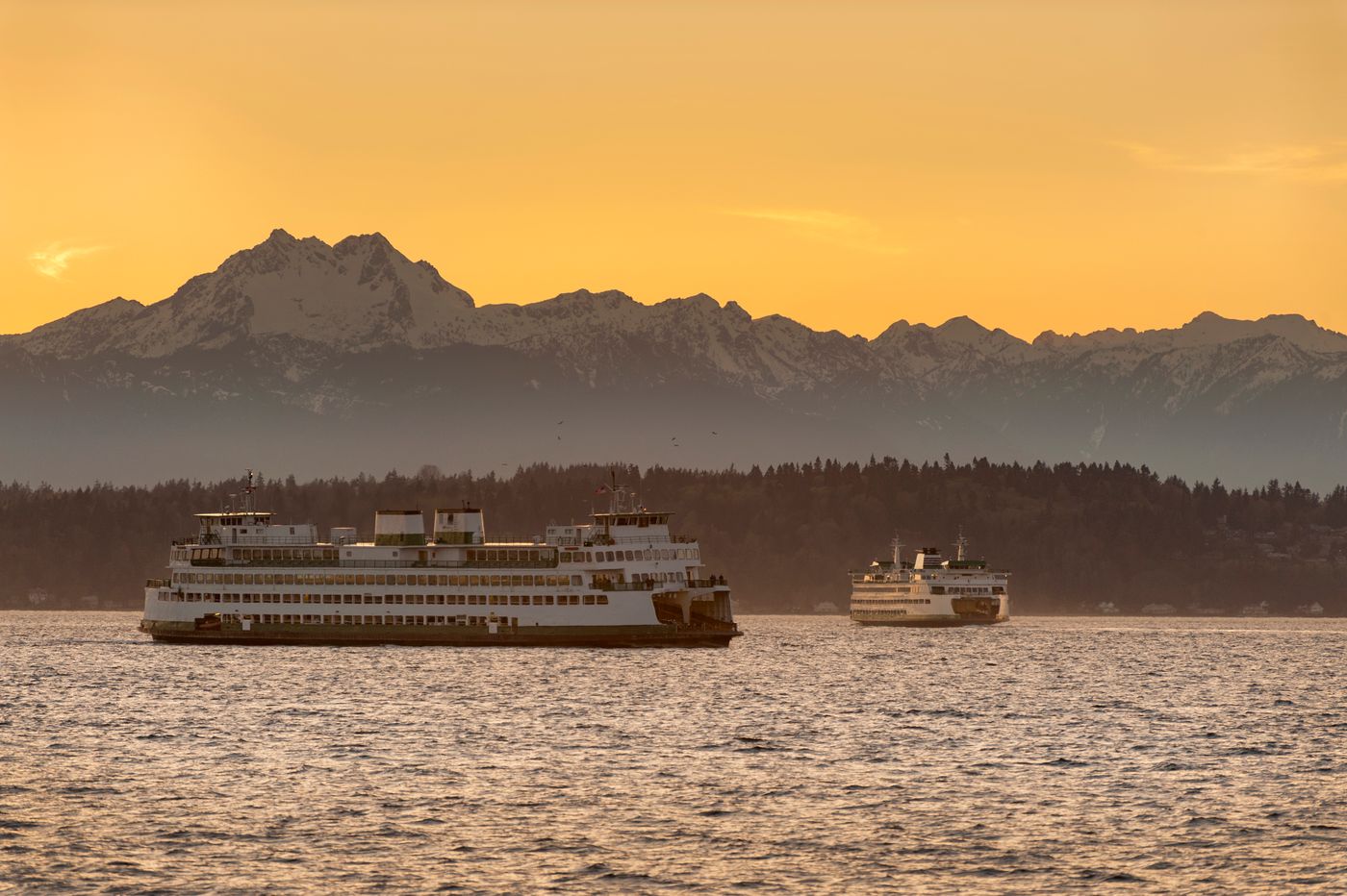 Olympic Mountains and ferry boats from Seattle