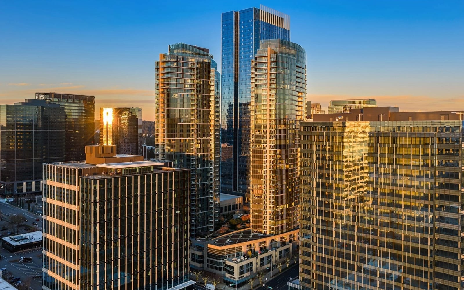 Bellevue Towers at golden hour — twin towers in downtown Bellevue at 10700 NE 4th St and 500 106th Ave NE