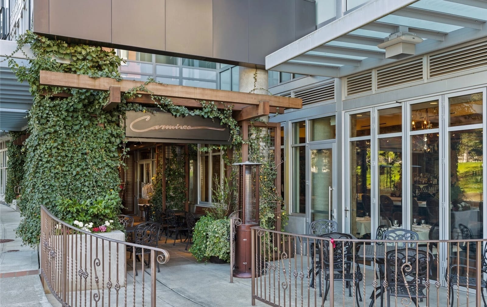 Mondrian Condos ground-level retail with Carmine's Italian restaurant at 10015 NE 4th St