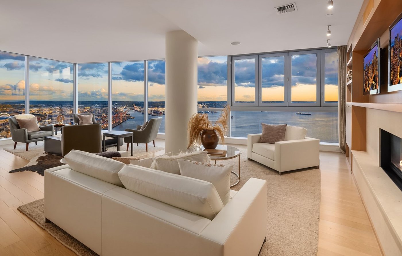 Living room with 180-degree Puget Sound and Olympic Mountain views