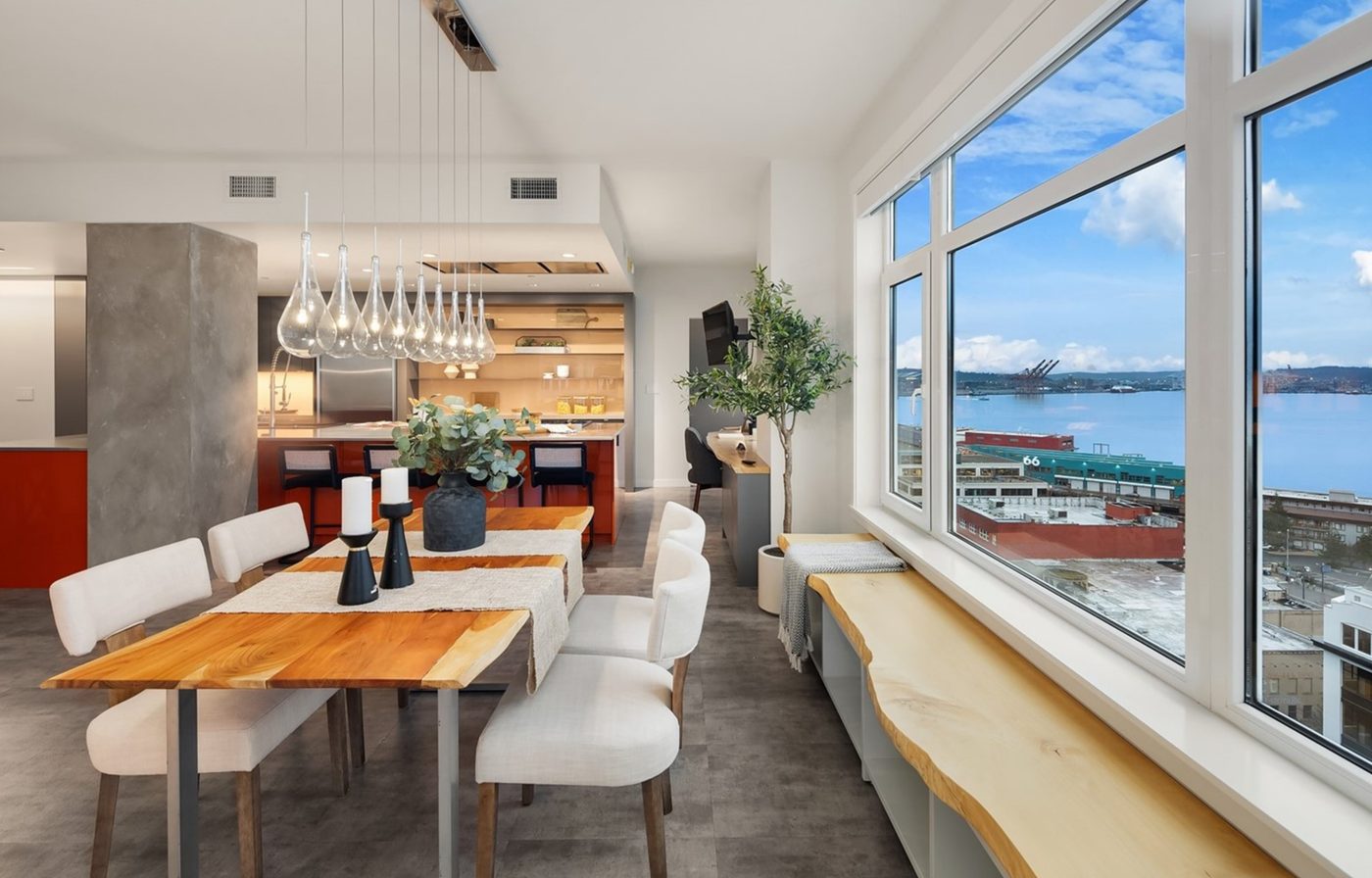 Dining area with live-edge table and Elliott Bay views