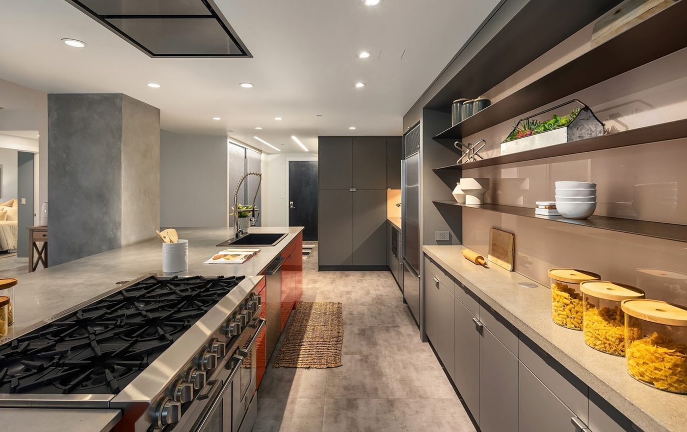 Kitchen detail — Schultz Miller Design with concrete counters and open shelving